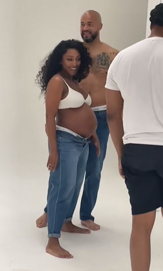 The singer looked sensational in the white bra and jeans