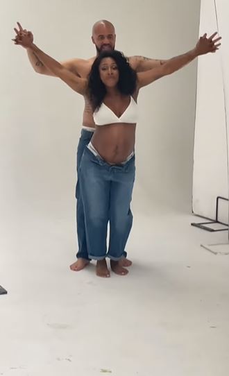 Pregnant Alexandra Burke showed off her baby bump as she danced in her bra