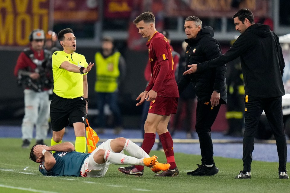 Mexican forward Gimenez writhed on the floor in agony after the clash