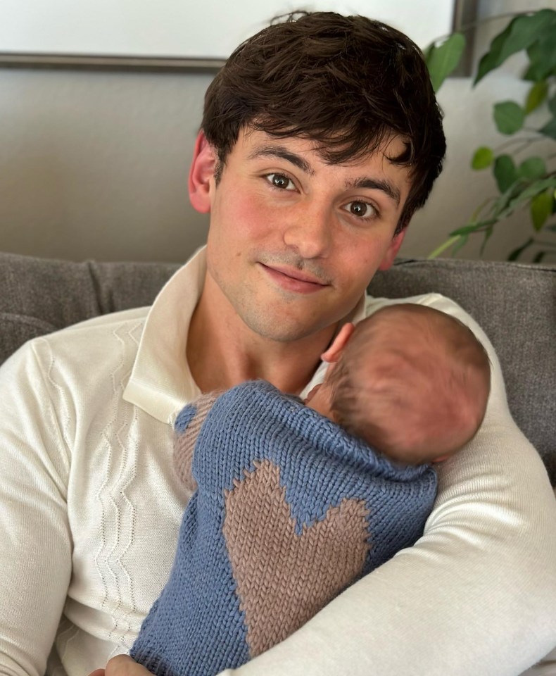 The diver cuddled up to his son
