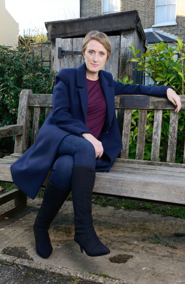 Jenna Russell sitting on a park bench.