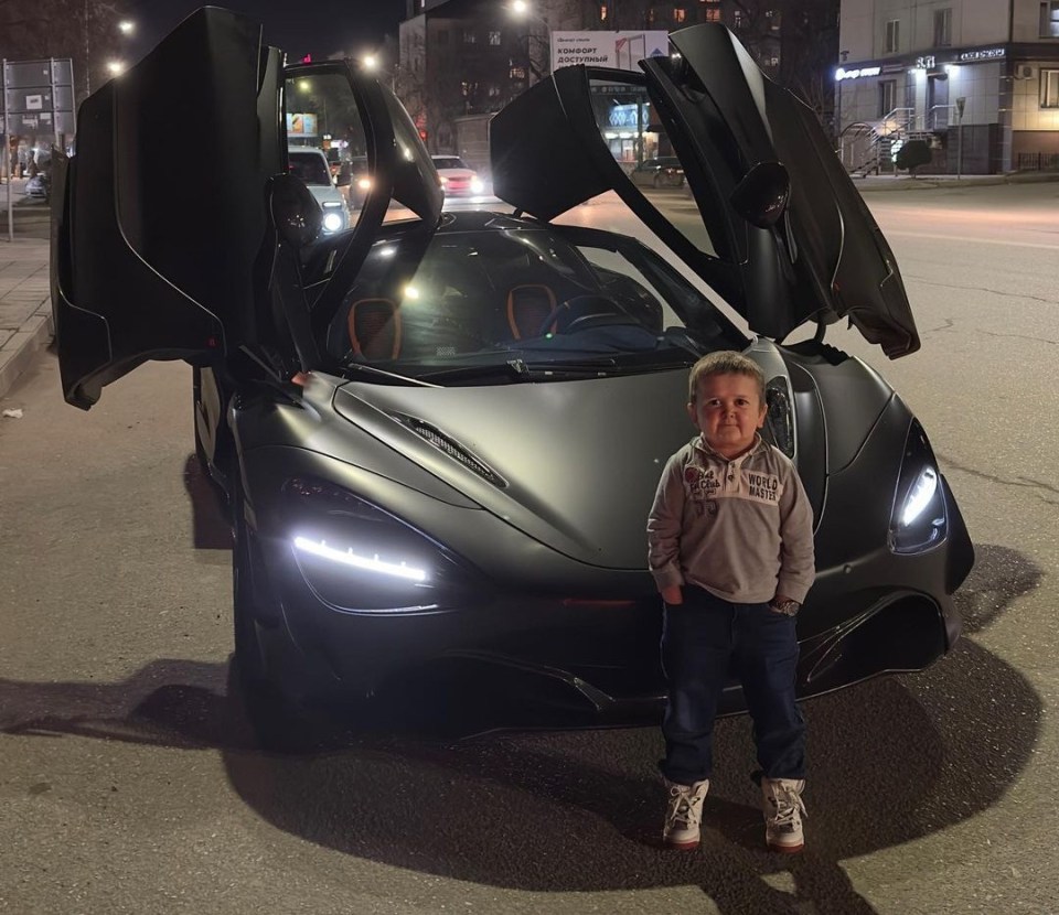 Hasbulla often poses in front of supercars