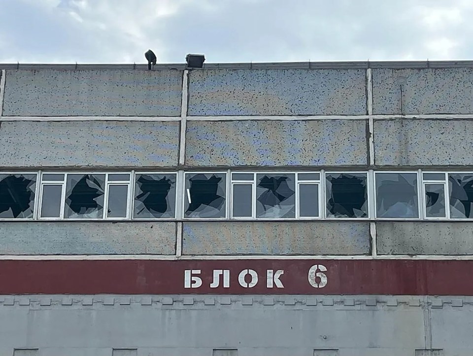 Windows of reactor building six can be seen destroyed