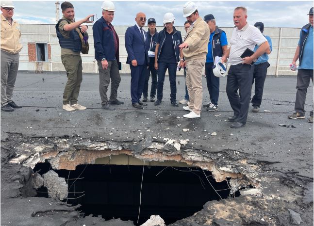 The roof of one of the reactor buildings was damaged in strikes
