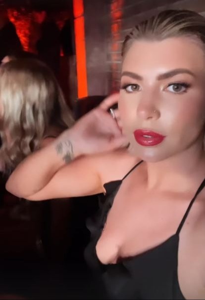 Olivia Bowen looked glam in a plunging black dress in Marbella