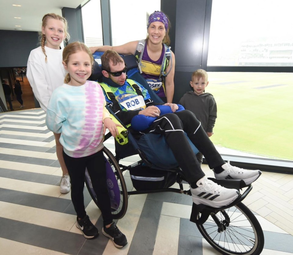 Rob with his family for support at the Leeds Marathon
