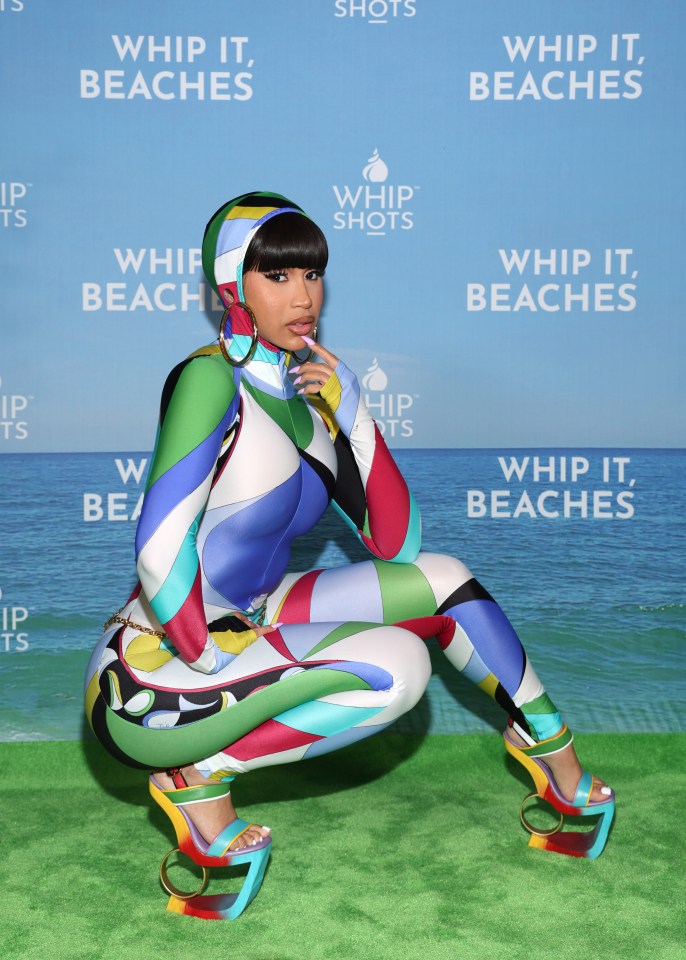 Cardi B donned this vivid hooded catsuit in Los Angeles
