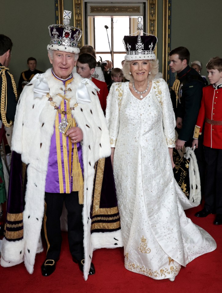 Stunning new pictures show the new monarchs before stepping out onto the Buckingham Palace balcony