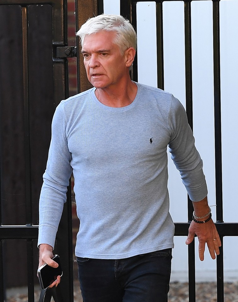 Phillip looked strained as he headed to the studio