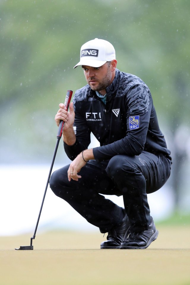 Corey Connors of Canada reads the green before his putt on the 9th during the third round