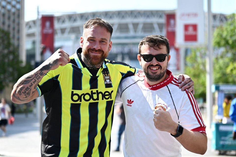 Rival Man City and United pals soak up the sun on Wembley Way