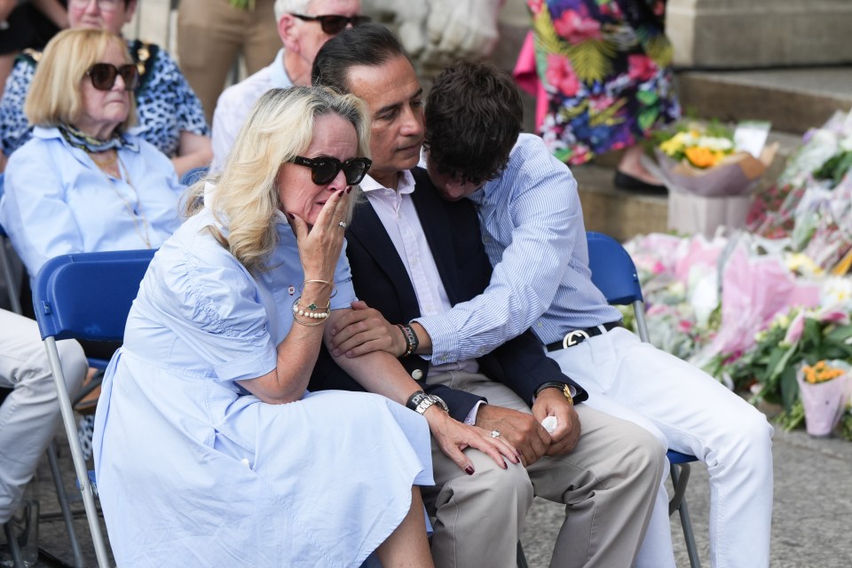 Grace's family embraced each other as they broke down