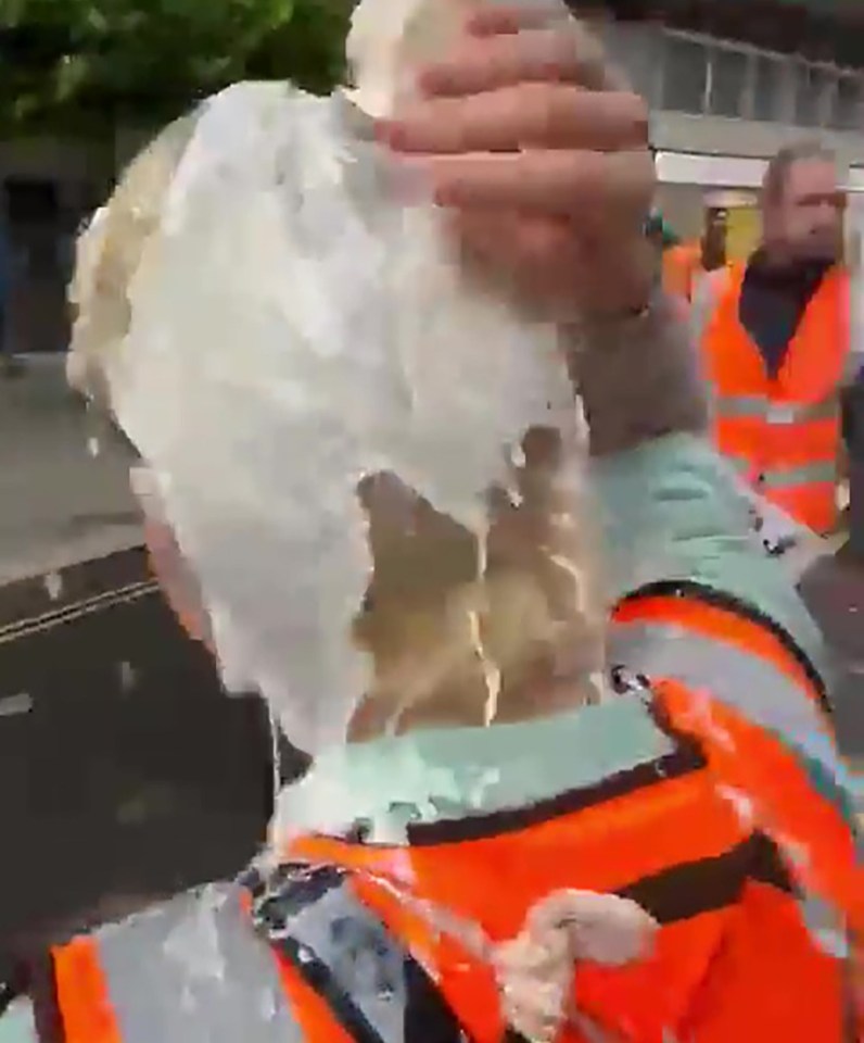 He even threw the plastic carton at one of the protesters