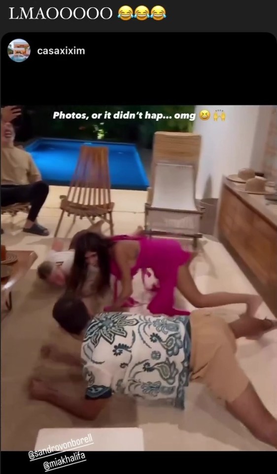 Mia Khalifa gets down on all fours to take part in the challenge