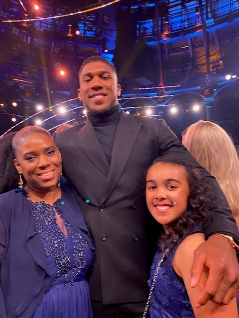 The boxing champ with carer and Young Hero winner Jayden Sorhaindo, who saved mum Natasha’s life