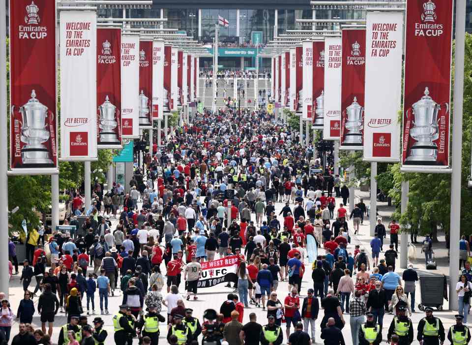 Thousands of fans arrive at Wembley Way in the sun ahead of 3pm kick-off