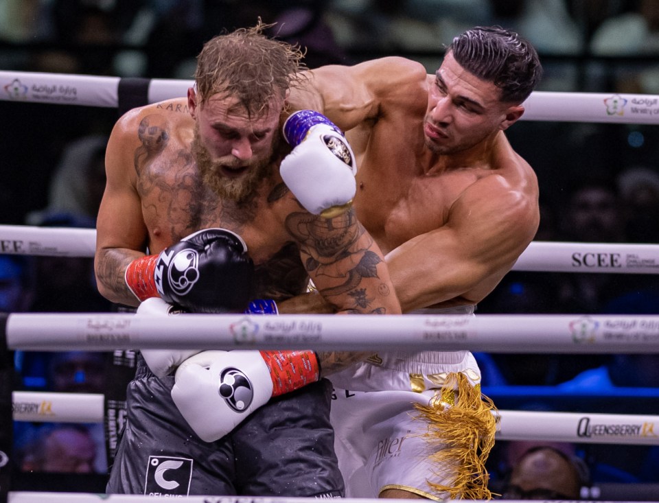 Jake Paul (left) boxing Tommy Fury.