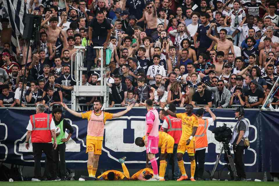 Rodez’s Lucas Buades was knocked to floor after scoring