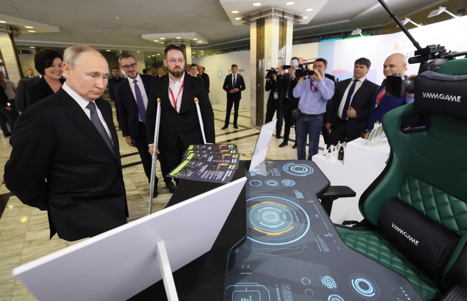 Viewers were left baffled at Putin's drawing as he attended the tech forum