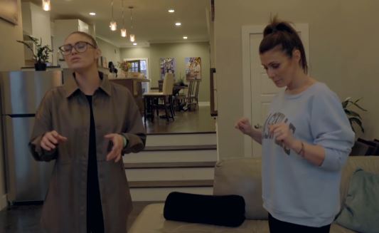Emilie and her famous mum Kym singing together