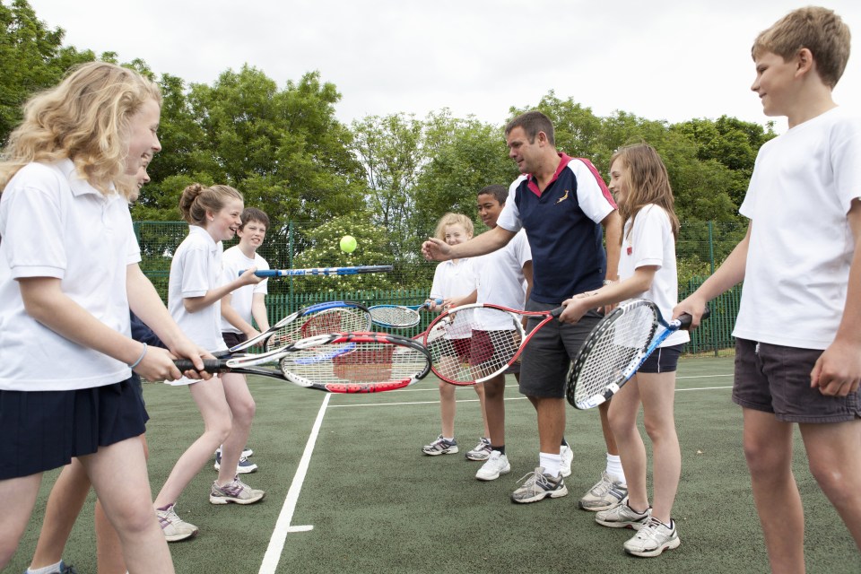 Try tennisforfree.com for a list of free coaching sessions in your area