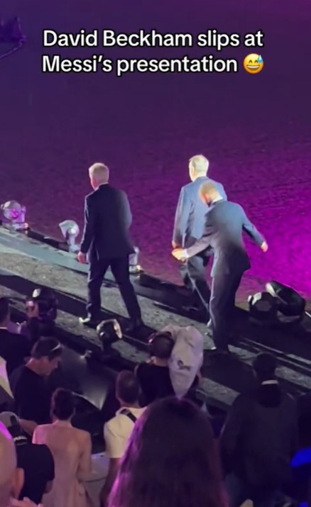 David Beckham slipped and had to regain balance at Lionel Messi's unveiling