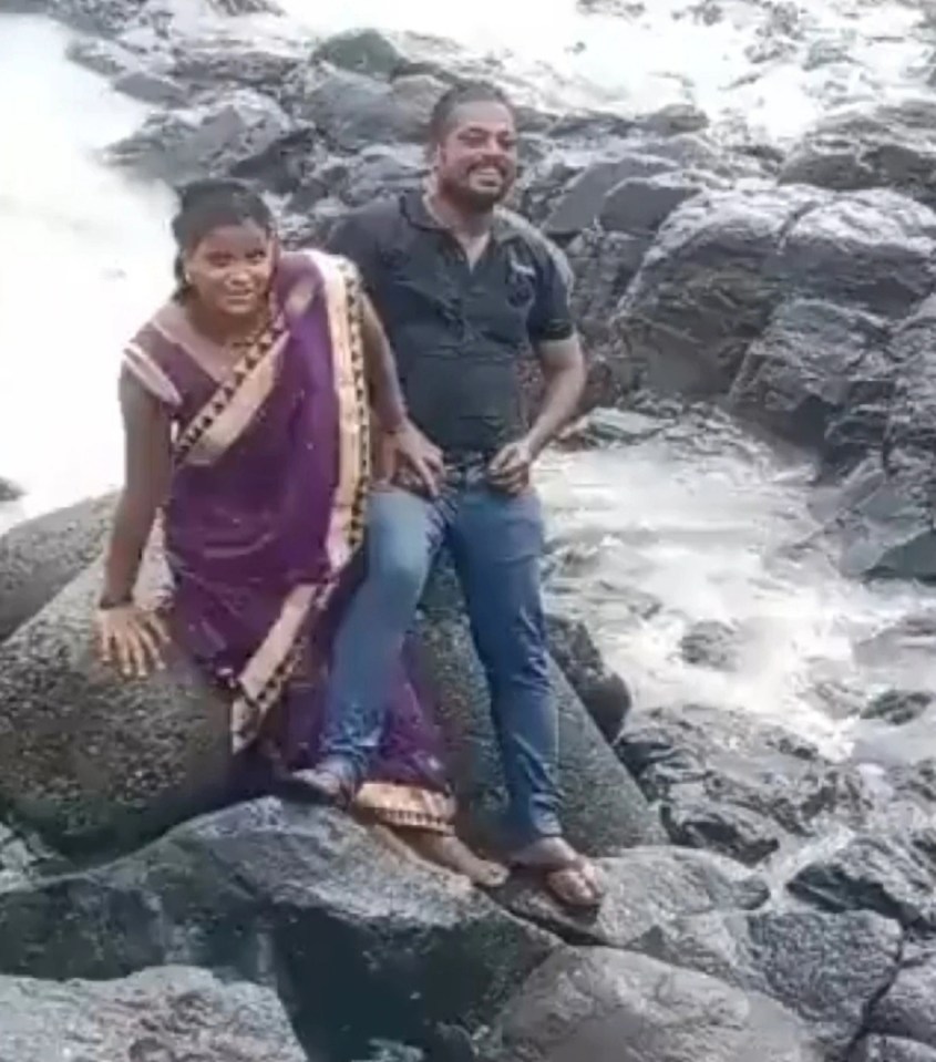The two had been snapping photos by the seaside
