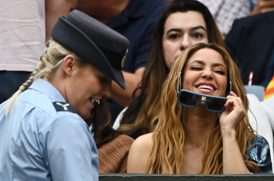 There were smiles from the singer too as she joined in Alcaraz's joy