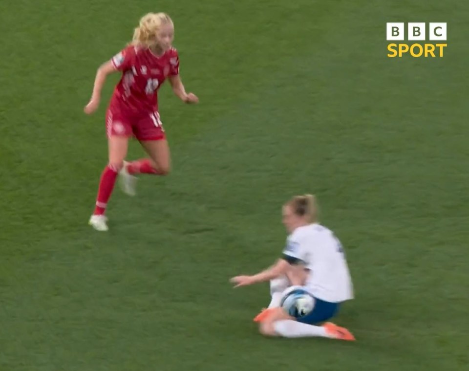 Walsh intercepted the ball but her foot got stuck in the turf