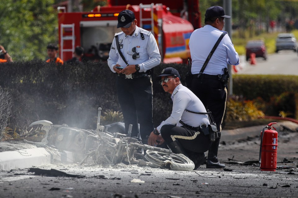 A motorcyclist and a car driver died after being hit by the plane