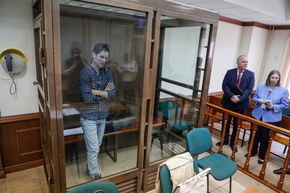 Evan Gershkovich pictured with U.S. Ambassador to Russia Lynne Marie Tracy at a Moscow court hearing