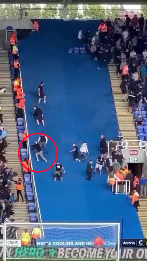 A Peterborough fan could be seen walking across the divide