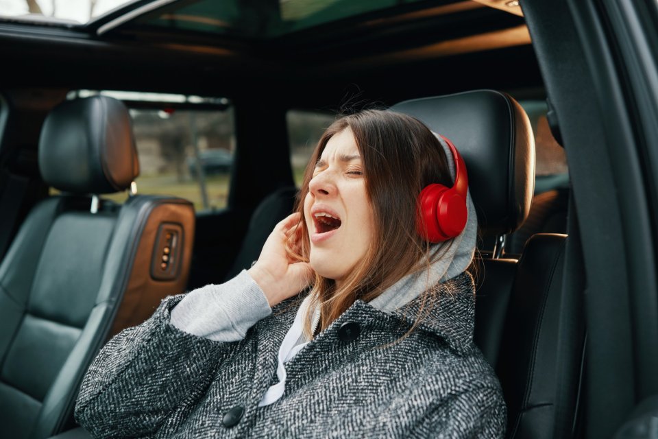 There is no specific law that states you can't wear headphones while driving
