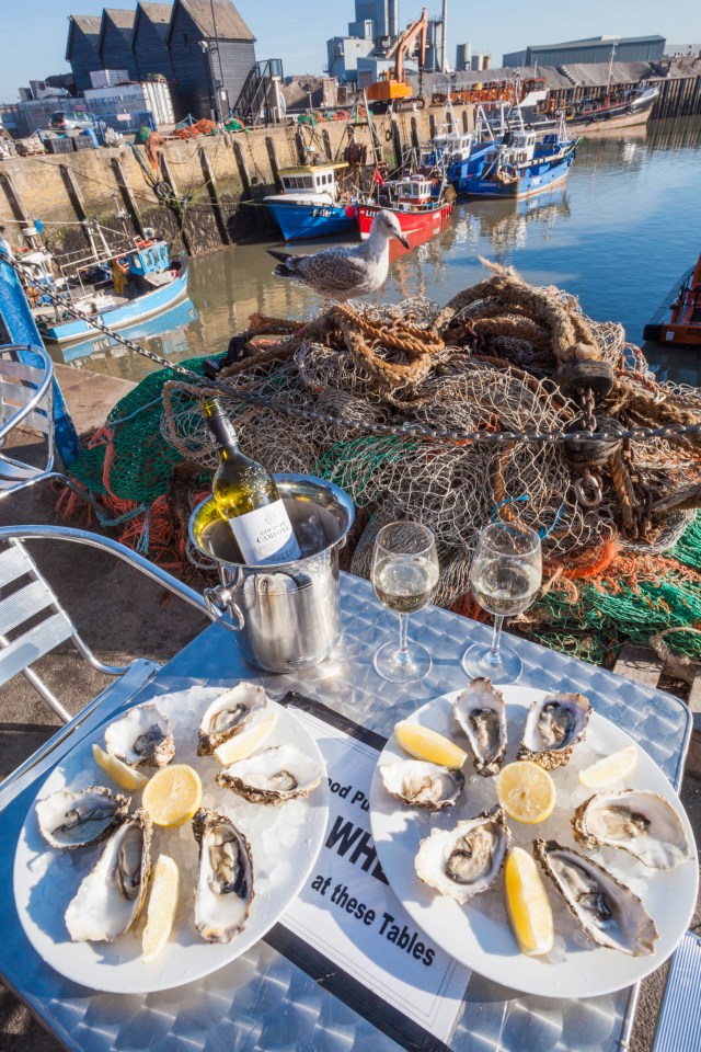 Daniel Craig has been spotted eating oysters in the town with his wife