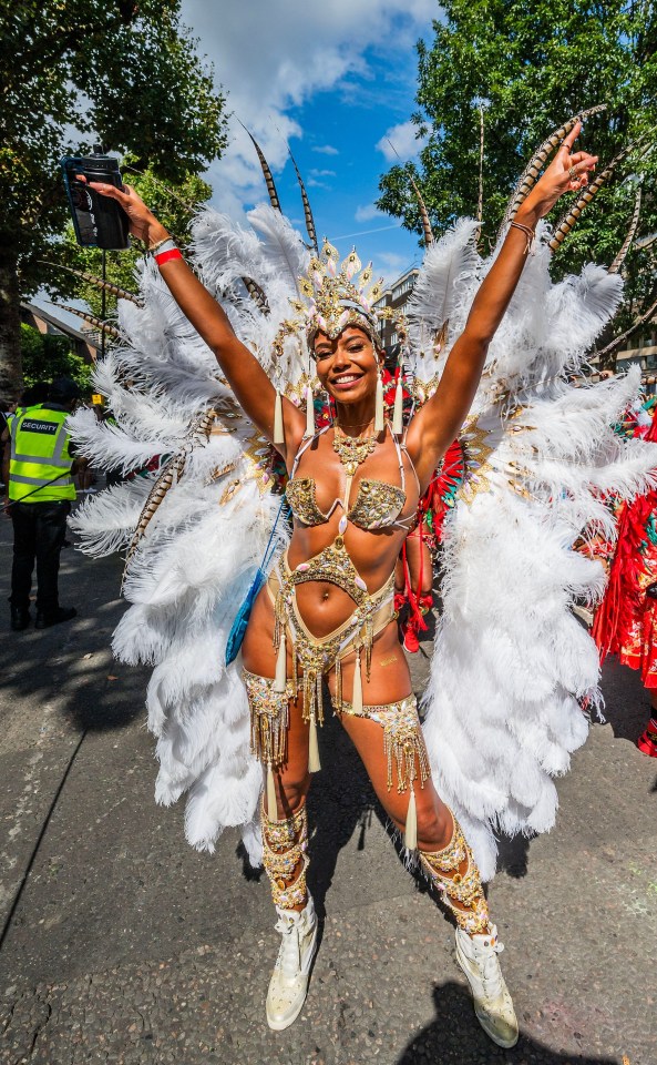 Pictures show the narrow streets around Ladbroke Grove teeming with bright colours