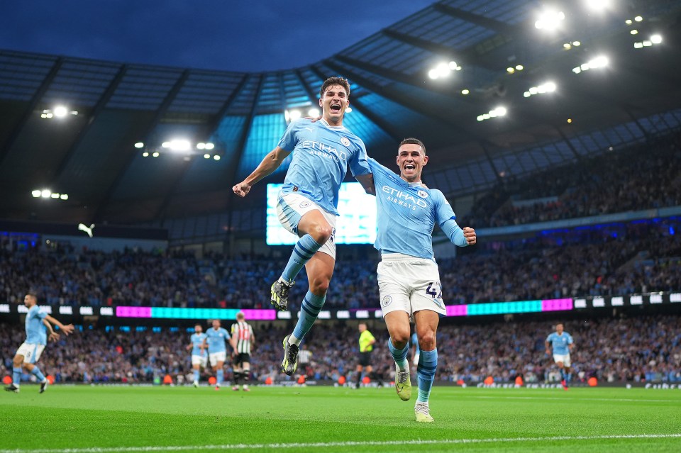 The Argentine celebrates with Phil Foden