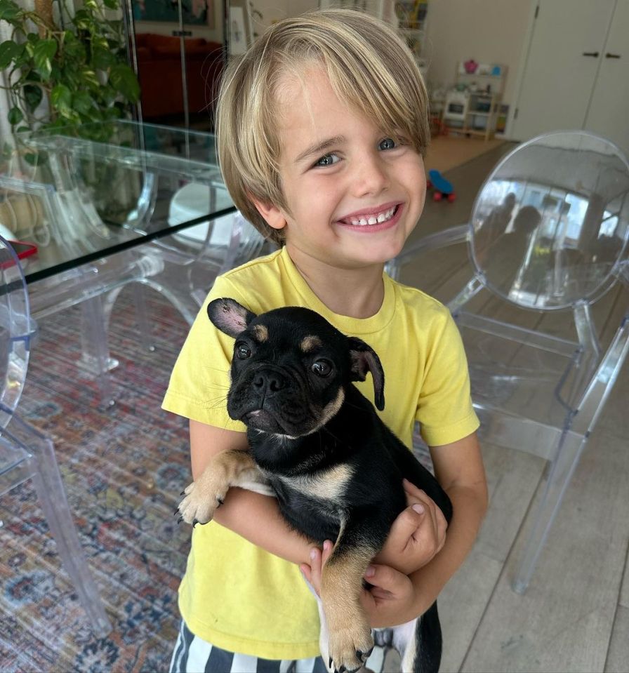 Four-year-old Theo looked delighted with his furry friend
