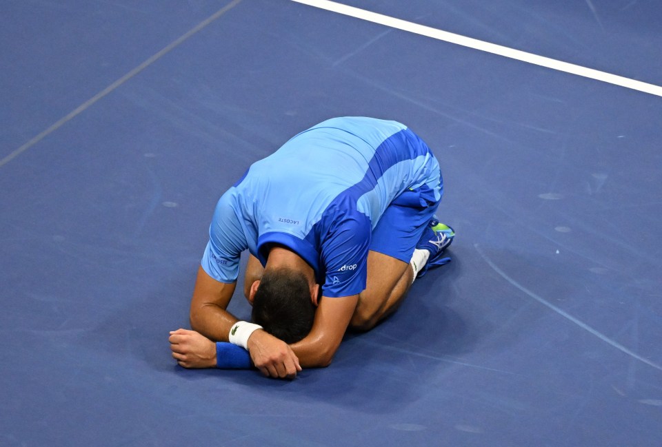 Djokovic fell to the ground and broke down in tears after triumphing in Arthur Ashe Stadium