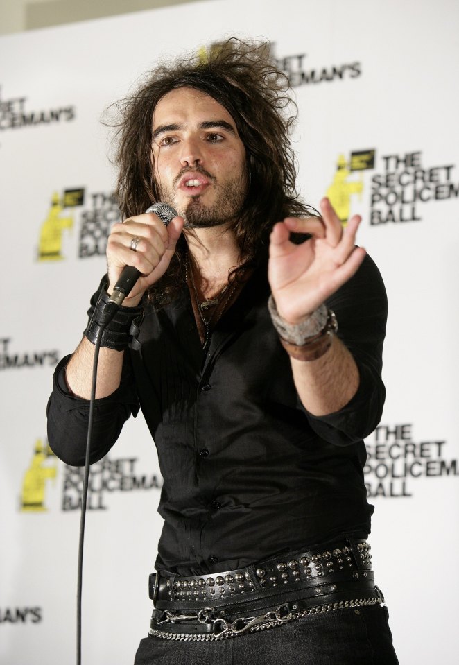 LONDON - OCTOBER 14: (UK TABLOID NEWSPAPERS OUT) Comedian Russell Brand speaks in the pressroom at the The Secret Policeman's Ball at The Royal Albert Hall on October 14, 2006 in London, England. The event sees the launch of Amnesty International's 'Protect The Human Week' and is based on the series of comedy shows created thirty years ago by John Cleese and fellow comedians promoting human rights. (Photo by Claire Greenway/Getty Images)