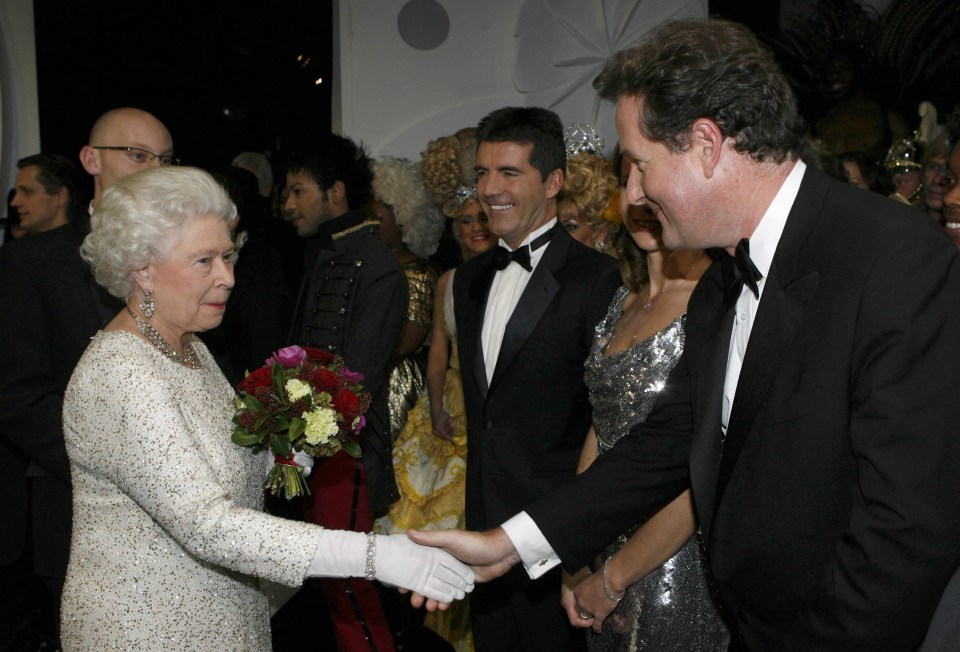 Piers greets the Queen at a Royal Variety Show. This picture takes pride of place on his sitting room mantelpiece