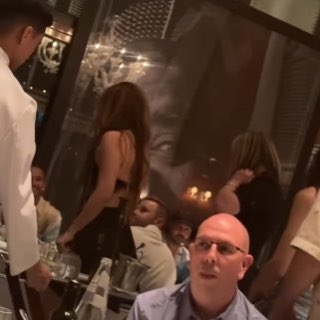 The pair have also been spotted out to dinner together more than once, as the F1 ace can be seen here smiling up at her