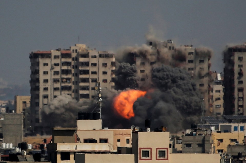 An explosion on a residential tower caused by Israeli raids in the northern Gaza Strip