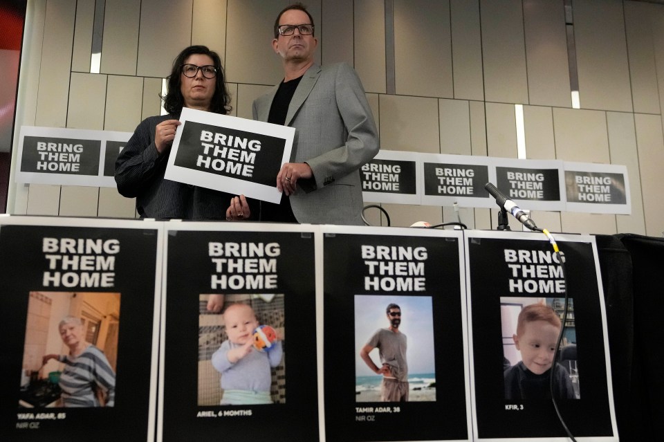 Sharon Lifschitz, left, and Noam Sagi, right, whose relatives have been taken hostage in Israel at a press conference in London