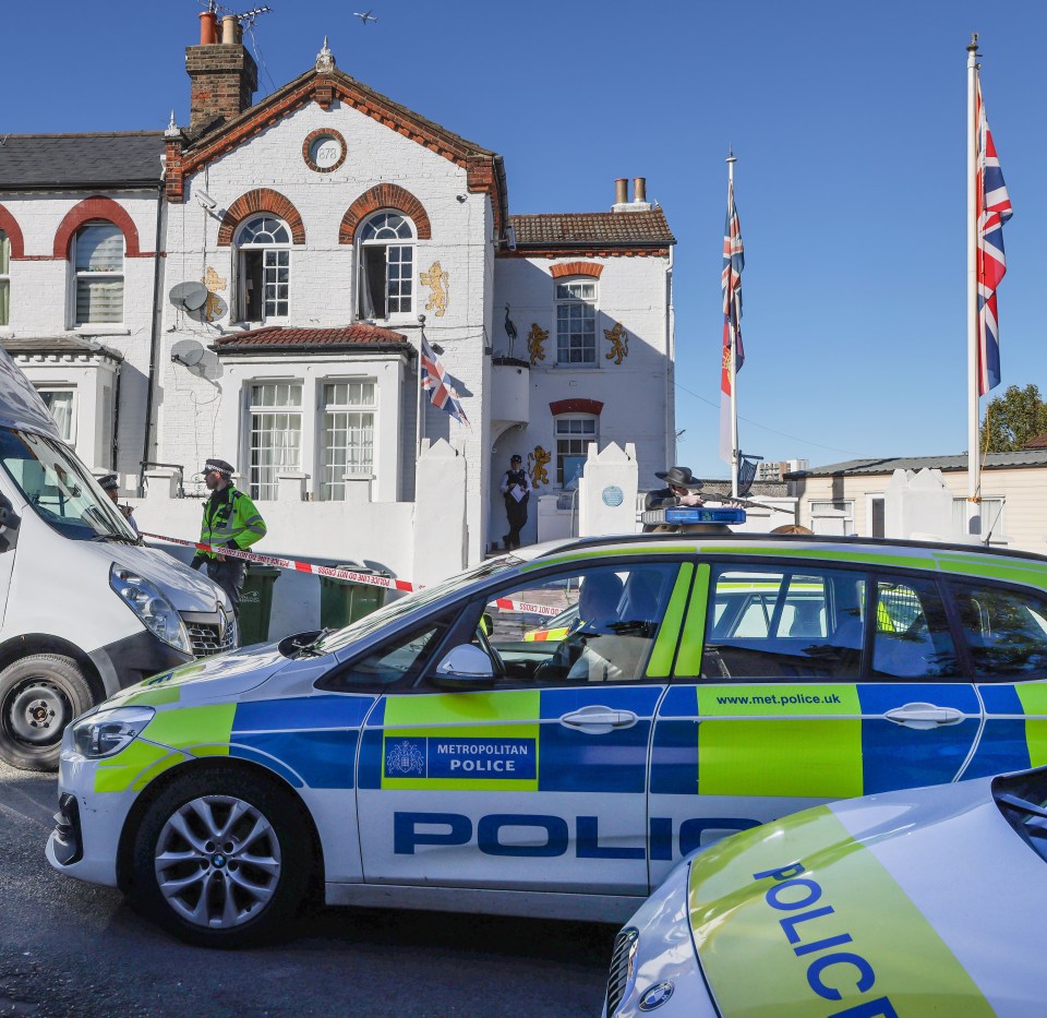 Police outside Courtney's home on Sunday after his body had been discovered