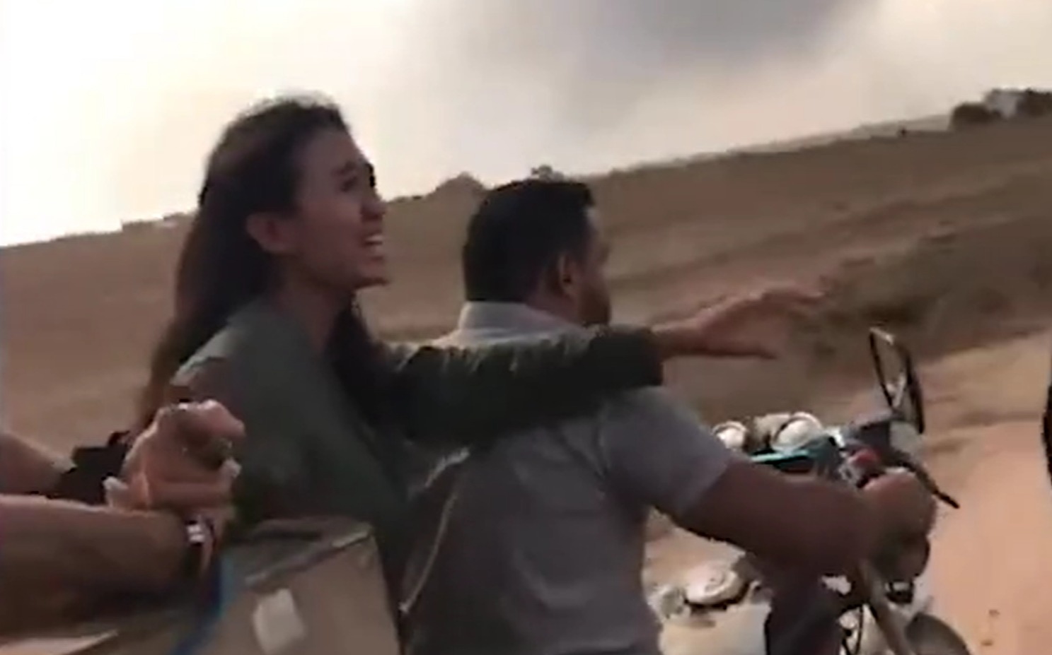 Gunmen trapped her on a motorcycle after attacking revellers at the event