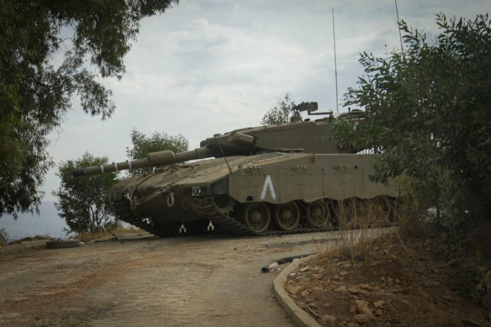 © Ian Whittaker.27/10/2023..As Israel prepares for the full-scale assault on Gaza there is an even more terrifying conflict brewing on the northern border. Iran-backed militia Hezbollah which operates from Lebanon..Kiryat Shemona is one of the ghost towns on the Israel border where locals have been evacuated leaving just soldiers and local militias..Pictured.Israel Merkava Tank near the border...Photo credit : Ian Whittaker