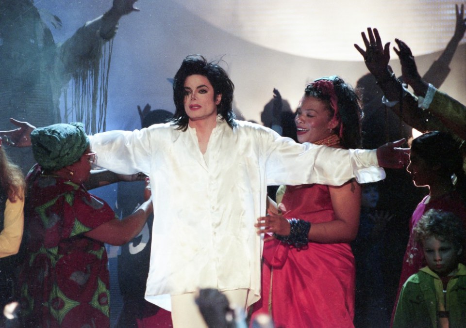 Michael Jackson performing on stage during the BRIT Awards in 1996