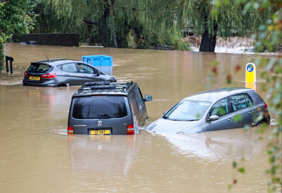 Cars submerged due to flooding in Ryde on the Isle of Wight