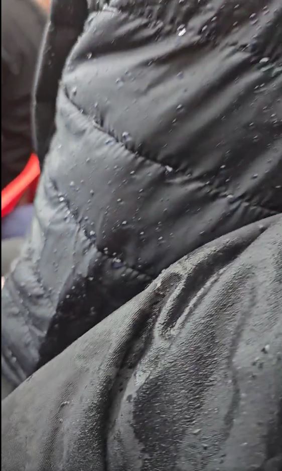 A Manchester United fan exposed the leaking roof at Old Trafford