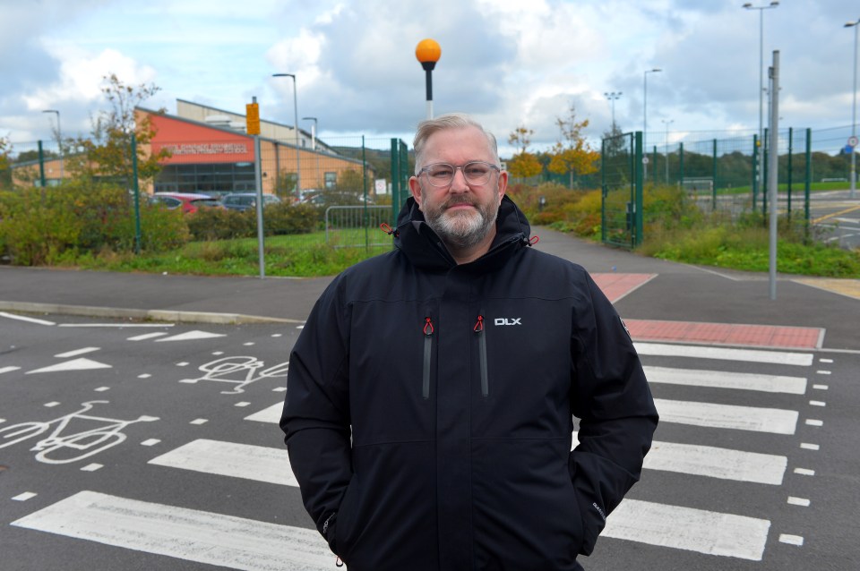Mal Harris said his road is 'carnage' with parents flocking to the area